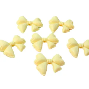 Large acrylic bow loose beads for DIY phone charms and beaded jewelry accessories.