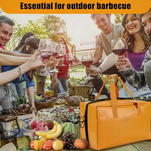 Portable orange insulated cooler bag for outdoor barbecue, picnic, and food storage use.
