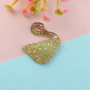 Close-up detail view of the holographic gradient glitter swan resin cabochon DIY craft accessory.