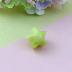 Detail shot of gradient acrylic star loose bead, ideal for handmade DIY jewelry craft.