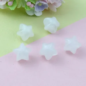 Detail view of acrylic fat star loose beads with through holes, ideal for DIY jewelry making.