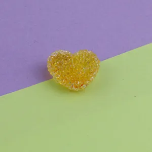 Yellow acrylic heart sugar bead detail shot, perfect for DIY jewelry making and craft accessories.