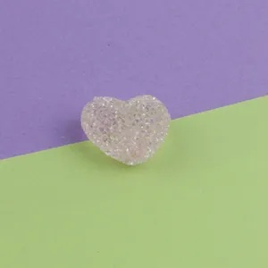 Close-up detail of the sparkling acrylic heart sugar bead, perfect for DIY jewelry making.