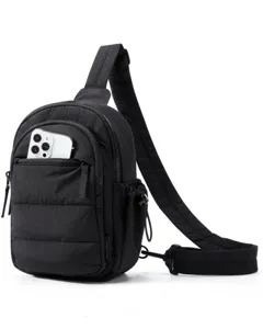 Black nylon mini vertical crossbody bag with front pocket for travel and daily wear.