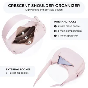Quilted crescent shoulder bag with adjustable strap, puffy underarm design, large capacity.