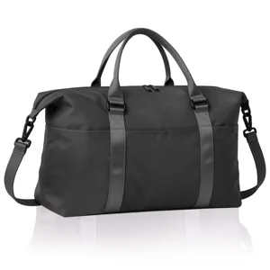 Vista dettagliata della grande borsa da viaggio impermeabile con manico resistente.