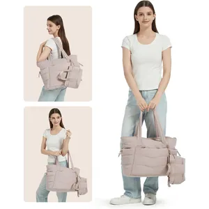 Detailed view of the large quilted tote bag showing multiple angles and carrying capacity.