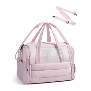 Pink breathable pet carrier bag with mesh windows and handles for cats and dogs outdoor travel.