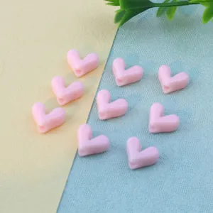 Pink heart-shaped loose beads detail shot, perfect for DIY handmade jewelry necklace bracelets.