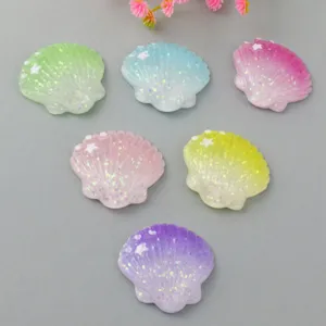 Colorful gradient resin shell charms, sparkling DIY cabochons for hair accessories and crafts.