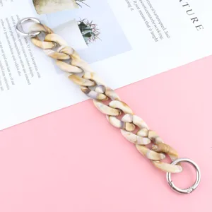 Fashion acrylic phone chain marble pattern strap decorative accessory with metal rings for women.