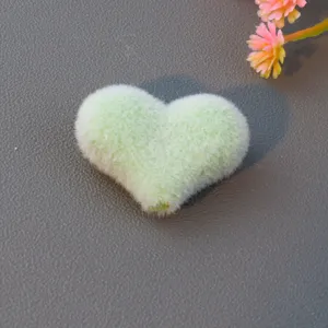 Green flocked heart bead detail, fuzzy charm accessory for handmade DIY jewelry crafting.