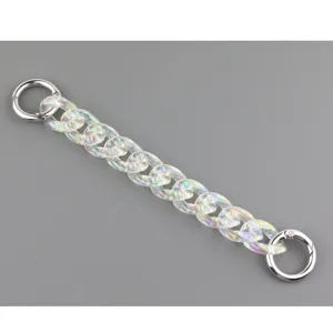 Detailed view of iridescent acrylic chain strap with silver spring rings for phone or bag charm.