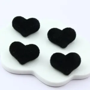 Black flocked heart-shaped loose beads for DIY jewelry making and crafting accessories.