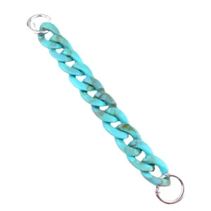 Stylish turquoise marble acrylic chain strap for phone cases and bags, trendy accessory.