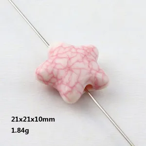 Perla acrilica stella crepata rosa vista dettaglio, 21x21x10mm, accessorio per gioielli fai da te