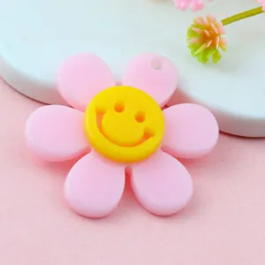 Ciondolo girasole in acrilico rosa con viso smiley giallo, grazioso ciondolo per accessorio DIY.