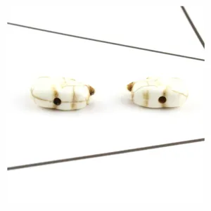White crackle turquoise stone elephant beads detail, cute animal spacer charm for DIY jewelry.