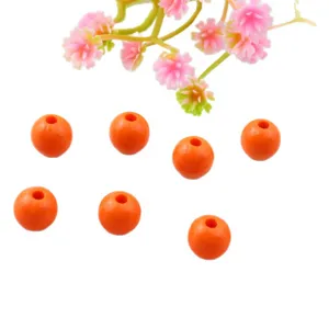 Orange acrylic round beads for DIY jewelry making, loose spacer beads accessories displayed.
