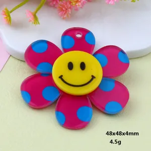 Acrylic flower pendant charm with cute yellow smiley face for DIY jewelry crafting design.