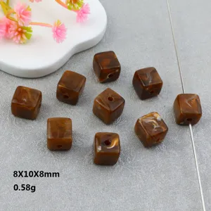 Bruine acryl gemarmerde vierkante kralen met recht gat voor DIY sieraden maken accessoires.
