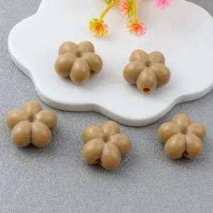 Acrylic plum blossom beads detail shot, 18mm five-petal flower spacer beads for DIY jewelry making.