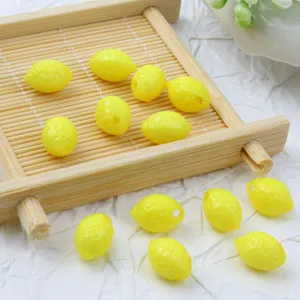 Yellow lemon shaped acrylic loose beads for DIY bracelet and phone chain making accessories.
