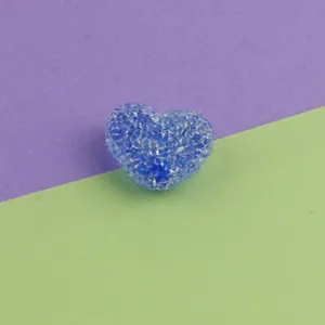 Blue acrylic heart sugar bead detail shot, perfect for DIY jewelry making and cute craft projects.