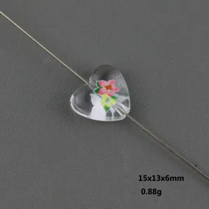 Transparent acrylic heart bead detail showing printed floral pattern and dimensions.