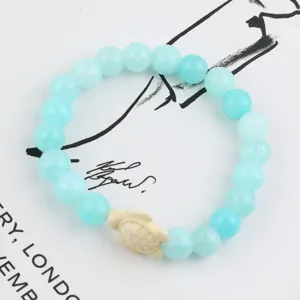 Turquoise stone sea turtle beaded elastic bracelet detail view, elegant women's jewelry.