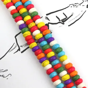 Detailed shot of colorful turquoise wheel beads, DIY loose bead crafting materials for jewelry.
