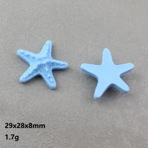 Blue resin starfish detail showing textured front and flat back, ideal for DIY craft projects.