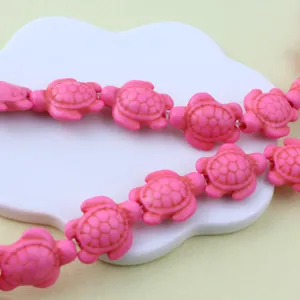 Pink turtle loose beads close-up detail for DIY jewelry making, bracelet and necklace beading.