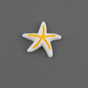 Resin starfish accessory detail shot, white with yellow stripes, ideal for DIY crafts.