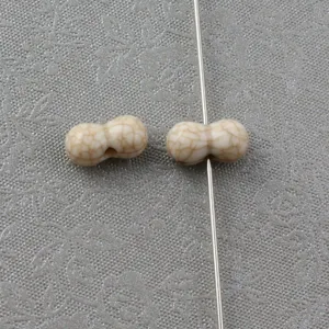 Perline di arachidi in acrilico screpolato perline sfuse per la creazione di gioielli fai da te.