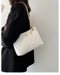 Women white quilted shoulder bag stylish chic crossbody bag with gold chain and floral hardware