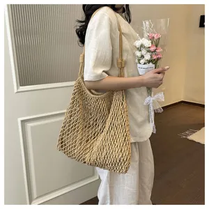 Woven hollow shoulder tote bag for women, stylish casual summer beach handbag and vacation bag.