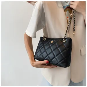 Black quilted shoulder bag with gold chain strap, stylish chic underarm bag for women