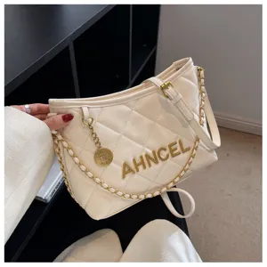 White quilted shoulder bag with chain strap and elegant chic design for women fashion daily use.