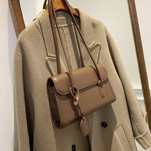 Stylish brown PU leather shoulder bag for women, chic crossbody underarm bag with minimalist design.
