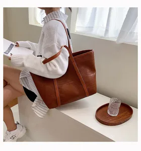 Chic large capacity brown crocodile pattern tote bag for women, ideal for daily commute.