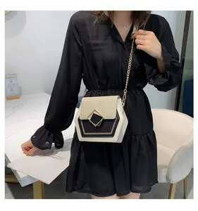 Fashion contrast color hexagonal shoulder crossbody bag with metallic chain and geometric lock.