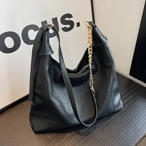 Black leather hobo shoulder bag for women, retro lychee pattern daily tote with chain strap.