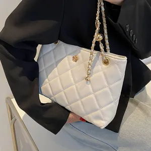 Elegant white quilted shoulder bag with chic gold chain strap for women spring fashion.