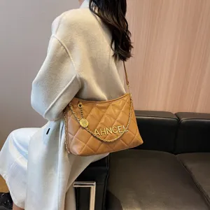Stylish quilted shoulder bag for women, elegant chain crossbody bag with chic design.