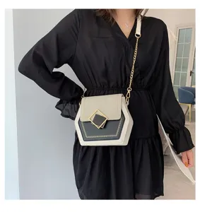 Detailed view of the women's chic color-block crossbody bag with metal chain strap.