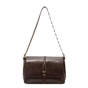 Retro brown leather shoulder bag for women, vintage chic small square crossbody bag.