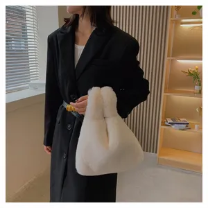 Stylish white faux plush handbag for women, soft fluffy hobo purse with cute knot handle design.