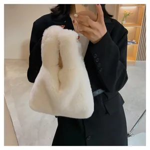 Chic fluffy plush handbag for women, versatile fuzzy tote bag with soft faux fur material.