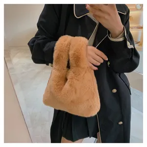 Detailed view of a trendy brown plush handbag, soft furry material, stylish mini tote bag.